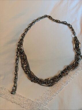 Metal belt. In brand new condition.  Full length 45”